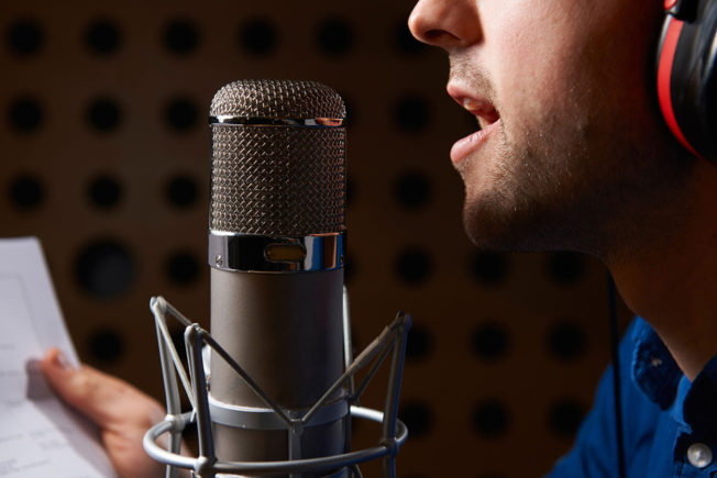 Man Singing in Microphone